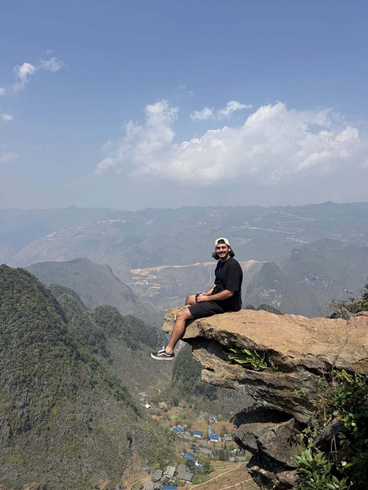 Solo traveller at a rocky viewpoint